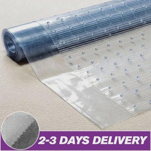 May include: A transparent plastic floor protector, rolled up and partially unrolled, showing a dimpled surface. The image includes a close-up of the dimpled surface and text that reads "2-3 DAYS DELIVERY". The protector is designed to protect flooring.