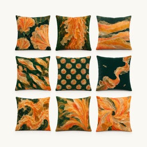 May include: A set of nine square throw pillows arranged in a grid, each featuring a dark forest green background with various abstract and floral-inspired patterns in shades of bright orange, gold, and cream, showcasing diverse artistic textures.