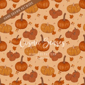 Op de afbeelding: Een naadloos digitaal patroon met handgetekende oranje pompoenen en kleine bruine blaadjes op een lichtoranje rasterachtergrond. De tekst "HAND DRAWN ARTWORK" staat op een bruine banner en "Cosmic Senses SEAMLESS PATTERN 300DPI PNG" is gecentreerd.