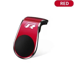 以下が含まれることがあります： 黒い円形の磁気部分が付いた赤い車の電話マウント。マウントはシルバーのトリムと赤い表面に白い「R」ロゴが付いています。「RED」という単語は、右上の赤い楕円の中にあります。