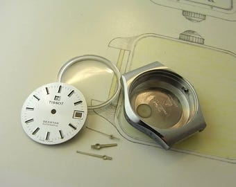 Caja, esfera y agujas de un reloj automático Tissot Seastar antiguo (Cal. 784).