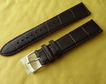 Vintage NOS Seiko 20mm brown leather men's watch with an 18mm gold buckle