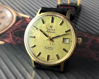 01 Reloj automático OLMA AS.1902 de los años 70, chapado en oro de 20 micras - 34 mm