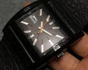 01 Reloj Slazenger vintage de cuarzo negro de 44 mm sin usar (NOS)