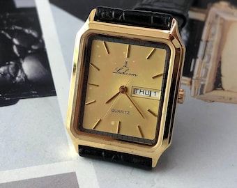 01 New Old Stock (NOS) Swiss LUKCOM Quartz Watch - 26mm Unisex