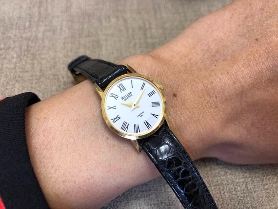 discontinued Bulova Longchamp white porcelain Dial Roman numerals quartz Ladies Watch 24mm View 2