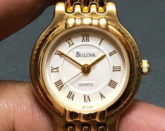 NOS Bulova Sunburst Dial Gold Bracelet Quartz Ladies Watch 23mm
