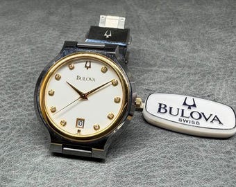 01 Rare High-End NOS Bulova B138T – Solid 18K Gold Bezel & Scratch-Proof Tungsten Case (35mm)