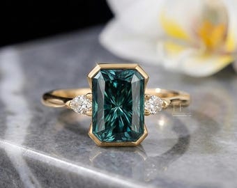 Türkiser Saphir Verlobungsring im Smaragdschliff, 14K Gold Lünette, Art Deco