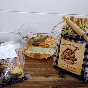 Simmer Pot Natural Home Fragrance Kit includes 3 bags of simmering potpourri in an adorable  shelf sitter burlap bag