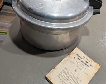 Olla a presión Mirro-Matic de 12 cuartos de galón, modelo M-0512-11, año 1979, con manual y peso.