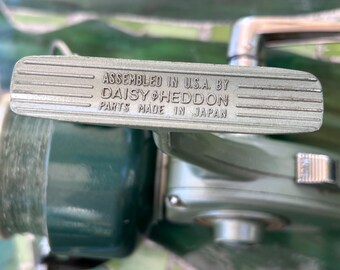 Daisy - Heddon 282 Fishing Reel Green Tones With Red Heddon Black
