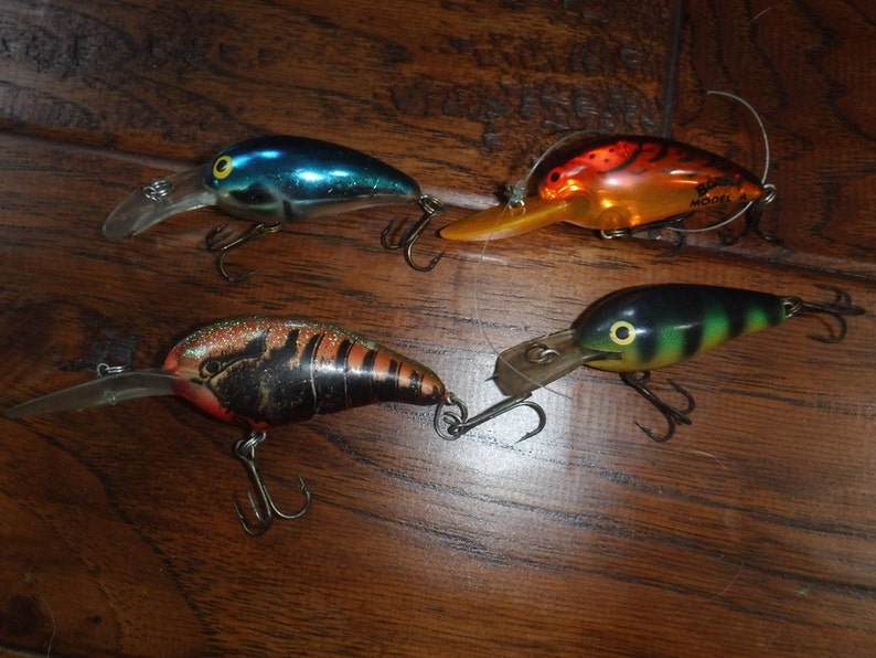 Vintage crankbait fishing lures including Larry Nixon Bomber Etsy