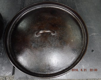 Cast iron Dutch Oven three legs stamped 14 on lid and base