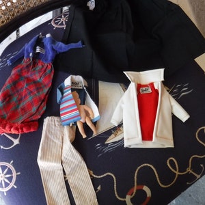 Barbie, Ken, Ricky and Skipper clothing white and black label