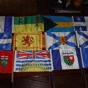 Flags vintage lot of 12 approx. 10&#39; x 6&quot; most are Canadian