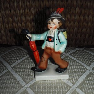 Cortendorf Porcelain 3092 Boy with umbrella and accordion