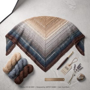 May include: A triangular crochet shawl featuring a gradient color pattern transitioning from beige to gray, blue, and dark brown. Includes three yarn skeins, a wooden crochet hook, a tag labeled ARTISAN CROCHET, dried lavender, and a ruler.