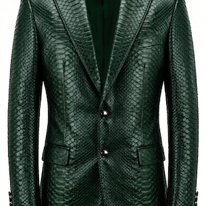 May include: A dark green blazer with a snakeskin texture. The jacket has a two-button closure, notched lapels, and two front pockets. The sleeves have buttoned cuffs. The blazer is a tailored fit.