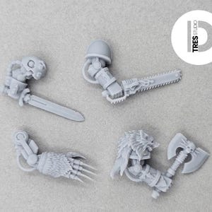 May include: Four grey miniature resin arm components for tabletop gaming figures. The set includes one arm with a sword, one with a chainsword, one with a clawed gauntlet, and one with a double-headed axe featuring a wolf-head shoulder pauldron.