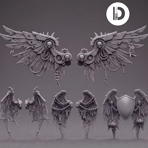 May include: A collection of grey miniature resin wings featuring mechanical gear details, skulls, chains, and a central shield emblem. The set includes large feathered wings with industrial components, tattered bat-like wings, and feathered wings adorned with hanging chains and small decorative charms.