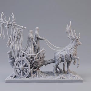 May include: A light gray resin miniature figurine depicting two figures standing in a chariot pulled by a large stag with prominent antlers. The chariot features intricate branch-like detailing, a spoked wheel, and a tall banner with a crescent moon.