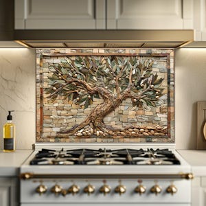 May include: A mosaic artwork of an olive tree with green leaves and olives, set against a stone background. The tree's trunk and branches are intricately detailed, framed by a brown border. The artwork is mounted above a cooker.