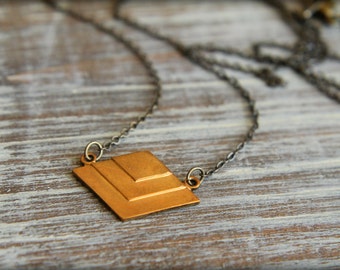 Layered Geometric Diamond Necklace in Raw and Aged Brass