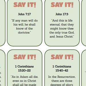 May include: Cards with Bible verses, each featuring the text "SAY IT!" in a red font. Verses include John 3:16, John 7:17, John 17:3, 1 Corinthians 6:19-20, 1 Corinthians 11:11, 1 Corinthians 15:20-22, 1 Corinthians 15:40-42, and Ephesians 1:10.