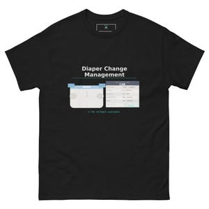 May include: A black t-shirt featuring a graphic with the text Diaper Change Management, a stylized diaper icon, and a software-style interface window labeled CAB with the text // No rollback available. below the graphic in white and blue.