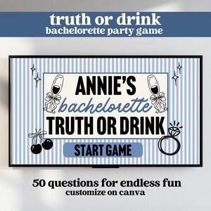 May include: A framed bachelorette party game with the text "truth or drink" and "Annie's bachelorette". The design includes champagne glasses, a ring, and cherries on a blue and white striped background. The game promises 50 questions for fun.
