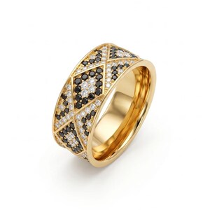 May include: A gold band ring featuring a geometric pattern of inlaid black and white stones. The outer surface is divided into triangular and diamond shapes, each filled with small, round, sparkling black and white stones set in gold.