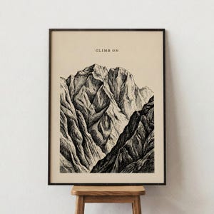 Climb On Mountain Print product detail closeup featuring vintage black ink illustration of dramatic mountain peaks on warm beige background with inspirational typography, minimalist nature wall art poster