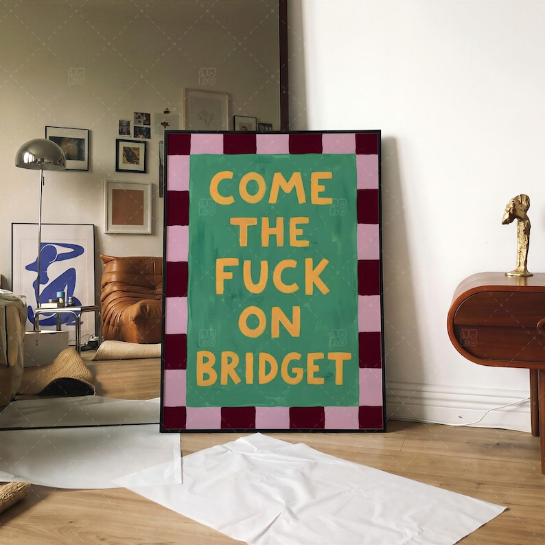Come The Fuck On Bridget funny typography poster in frame on wall, retro wall art mockup displayed in contemporary living room with modern furniture and eclectic decor