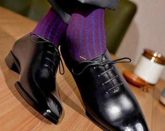 Bespoke Men's Handmade Black Leather One Piece Oxford shoe.