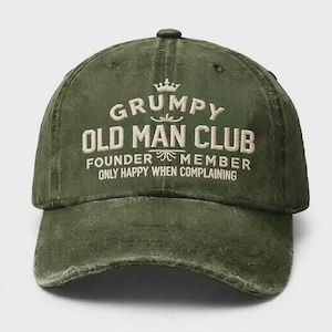May include: A distressed olive green baseball cap with the text "GRUMPY OLD MAN CLUB" embroidered in off-white. The cap also features the phrases "FOUNDER MEMBER" and "ONLY HAPPY WHEN COMPLAINING".