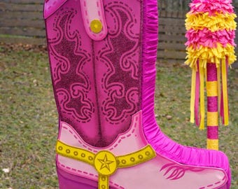 Piñata con stivale da cowgirl
