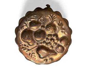 Molde vintage para hornear frutas de metal resistente para gelatina o pastel.