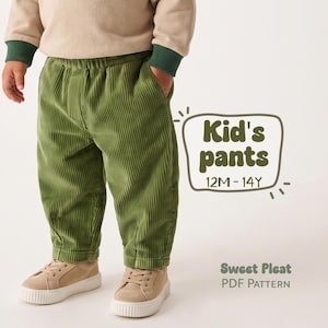 May include: Olive green corduroy pants with an elastic waistband and side pockets. The text on the right reads Kid's pants 12M-14Y and Sweet Pleat PDF Pattern. The pants are paired with a beige long-sleeve shirt with green cuffs and beige sneakers.