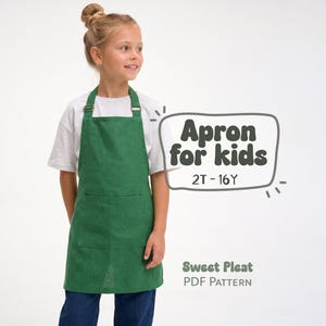 May include: A solid green apron with a front pocket, adjustable neck straps, and metal hardware. The text on the image reads: Apron for kids 2T - 16Y, Sweet Pleat PDF Pattern. The apron is worn over a white t-shirt and blue jeans.