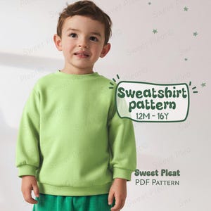 May include: A young child wearing a light green sweatshirt and green shorts. The image includes text that reads "Sweatshirt pattern 12M-16Y" and "Sweet Pleat PDF Pattern". The background is white with green star decorations.