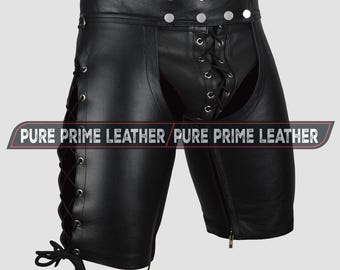 May include: Black leather shorts with lace-up and zipper details. The shorts feature silver-tone button accents at the waist and the text "PURE PRIME LEATHER" in a white banner.