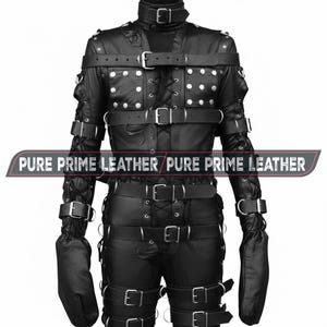May include: Black leather jacket and pants set with multiple straps, buckles, and silver-colored rivets. The jacket has a high collar and long sleeves with attached mittens. The text "PURE PRIME LEATHER" is displayed across the image.