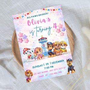 May include: A vibrant birthday invitation with Paw Patrol characters, featuring the text "Olivia's is turning 4". The invitation includes the date, time, and location details, with a decorative banner and star-shaped balloons.