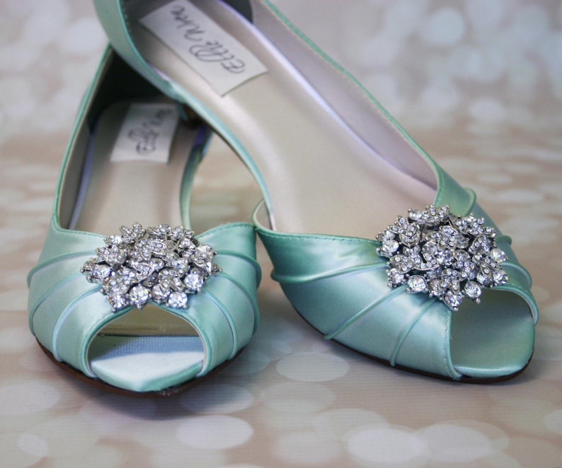 mint green and white shoes