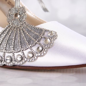 Gatsy style custom wedding shoes with a silver crystal art deco embellishment on the toe closed toe mid heel bridal shoes perfect for a roaring 20s wedding