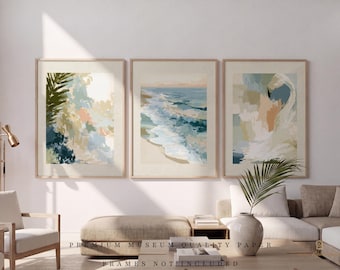 May include: A set of three vertical wall art prints featuring abstract coastal scenes in shades of blue, green, beige, and white. The prints are displayed in light wood frames. Text at the bottom reads: PREMIUM MUSEUM QUALITY PAPER FRAMES NOT INCLUDED.