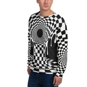 Puede incluir: Sudadera con cuello redondo y estampado de cuadros blancos y negros. El diseño presenta una ilusión óptica 3D, con un vórtice arremolinado y un efecto de goteo. Una prenda llamativa.