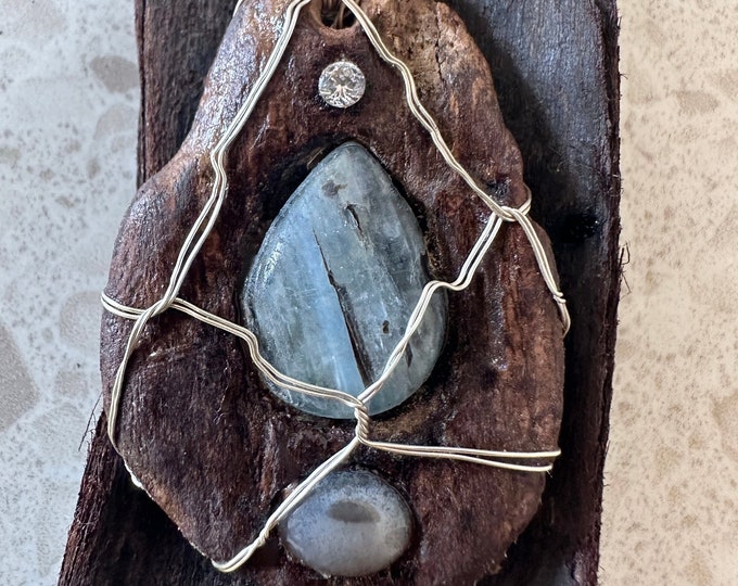 Wire wrapped Driftwood from Costa Rica pendant necklace with Tear drop shaped Kyanite stone