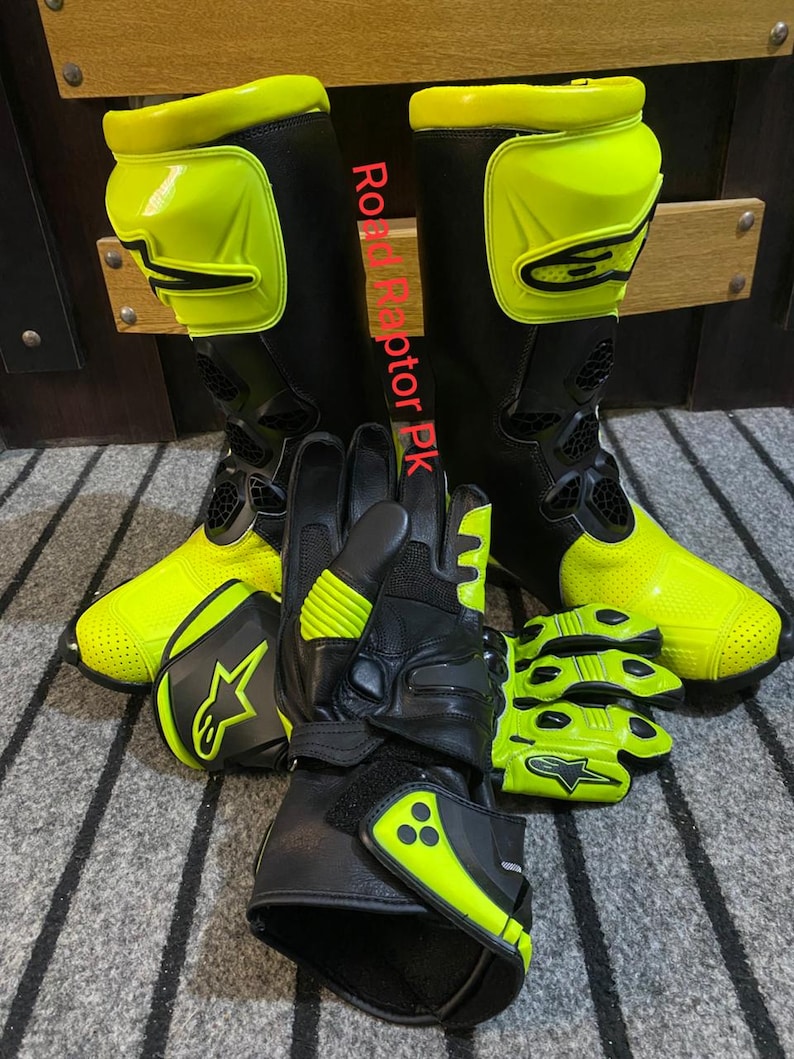 May include: Black and neon yellow motorcycle boots, gloves, and short gloves. The boots and gloves have the text "Road Raptor PK". The gloves and boots have the star logo.